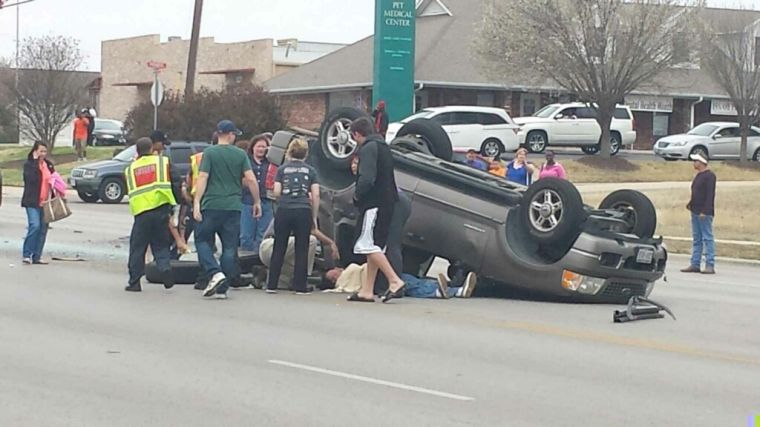 Vehicle flips multiple times in Heights